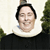 Eva, sognepr�st, blind. P� plakaten ses sognepr�sten Eva st� foran den hvidkalkede Snesere kirke p� Sydsj�lland